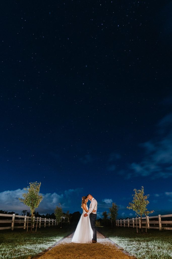 Wedding photo under the stars in the Hunter Valley, Dark Horse Vineyard. A composite of three images made in Photoshop.